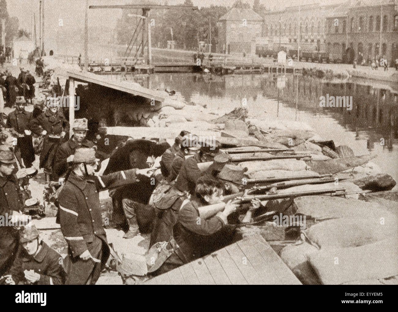 Belgian soldiers defending the sandbagged Willebrock Canal from the advancing Germans during WWI. Stock Photo