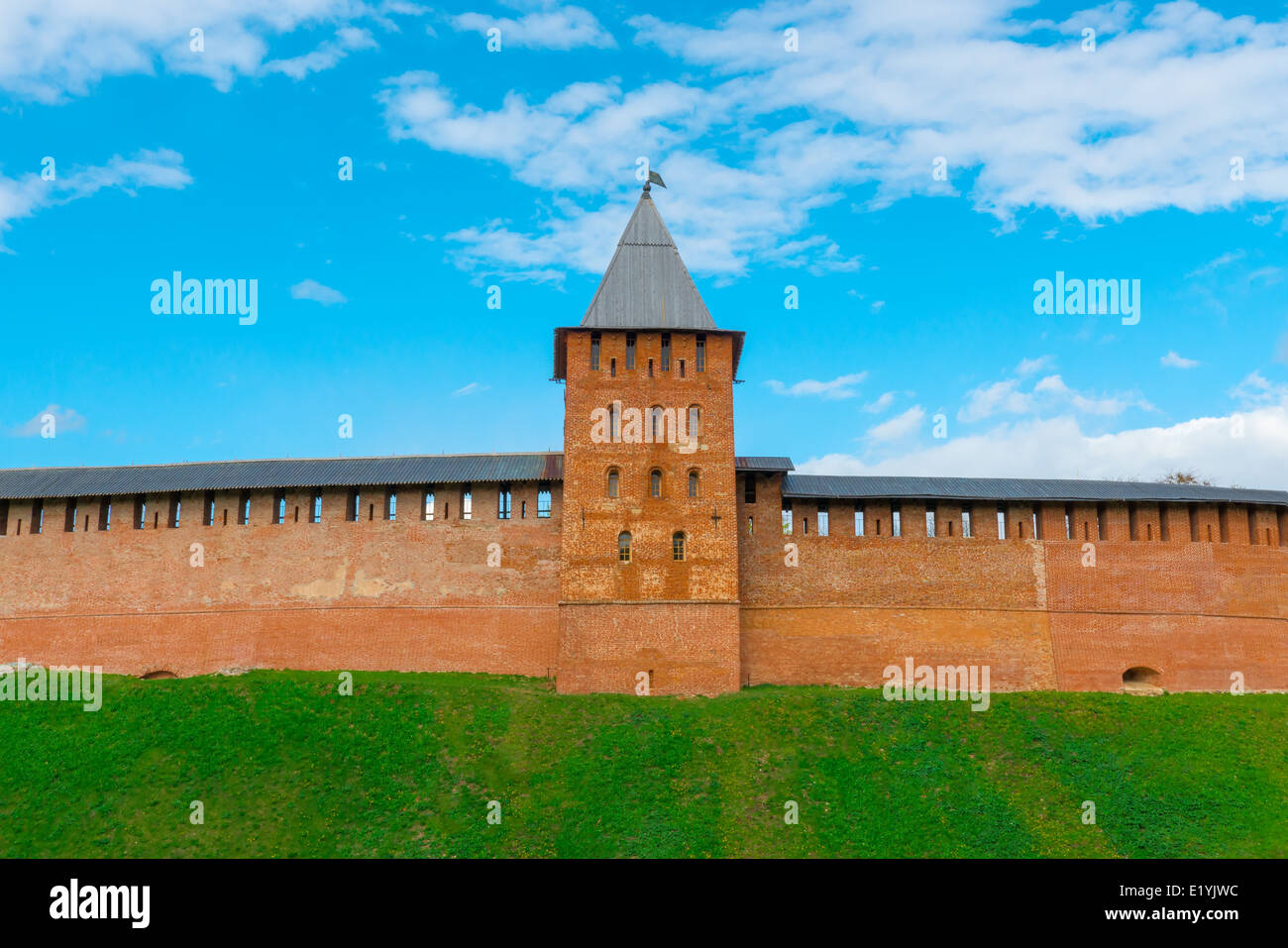 tower and wall of Novgorod Kremlin's redbrick Stock Photo