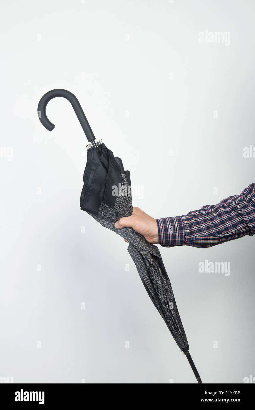 umbrella on hand Stock Photo Alamy