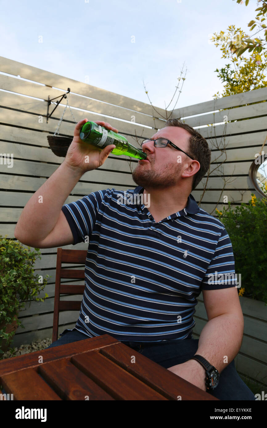 Angry Man Drinking Stock Photo - Alamy