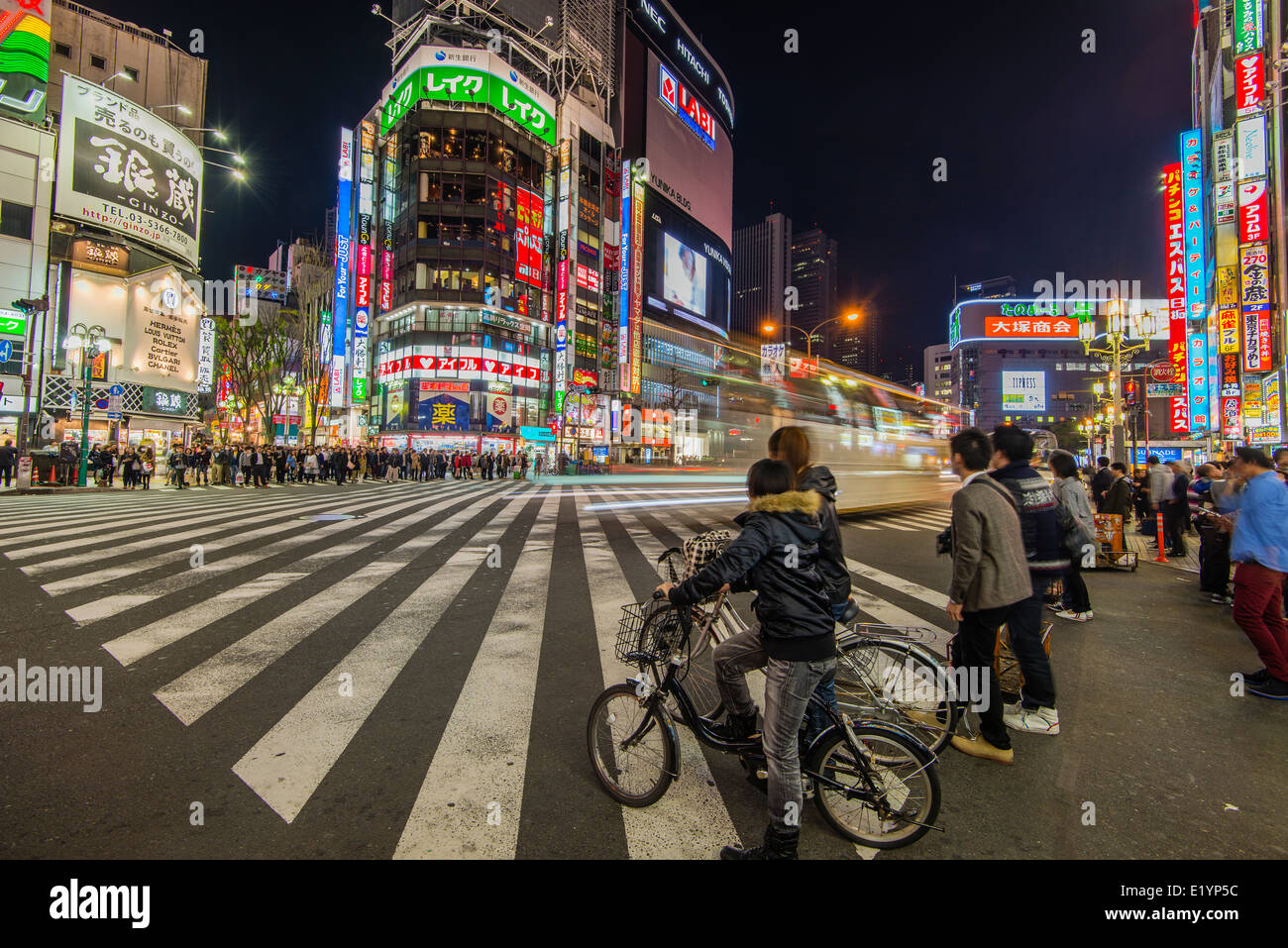 Night view of Yasukuni-dori street, Shinjuku district, Tokyo, Japan Stock Photo