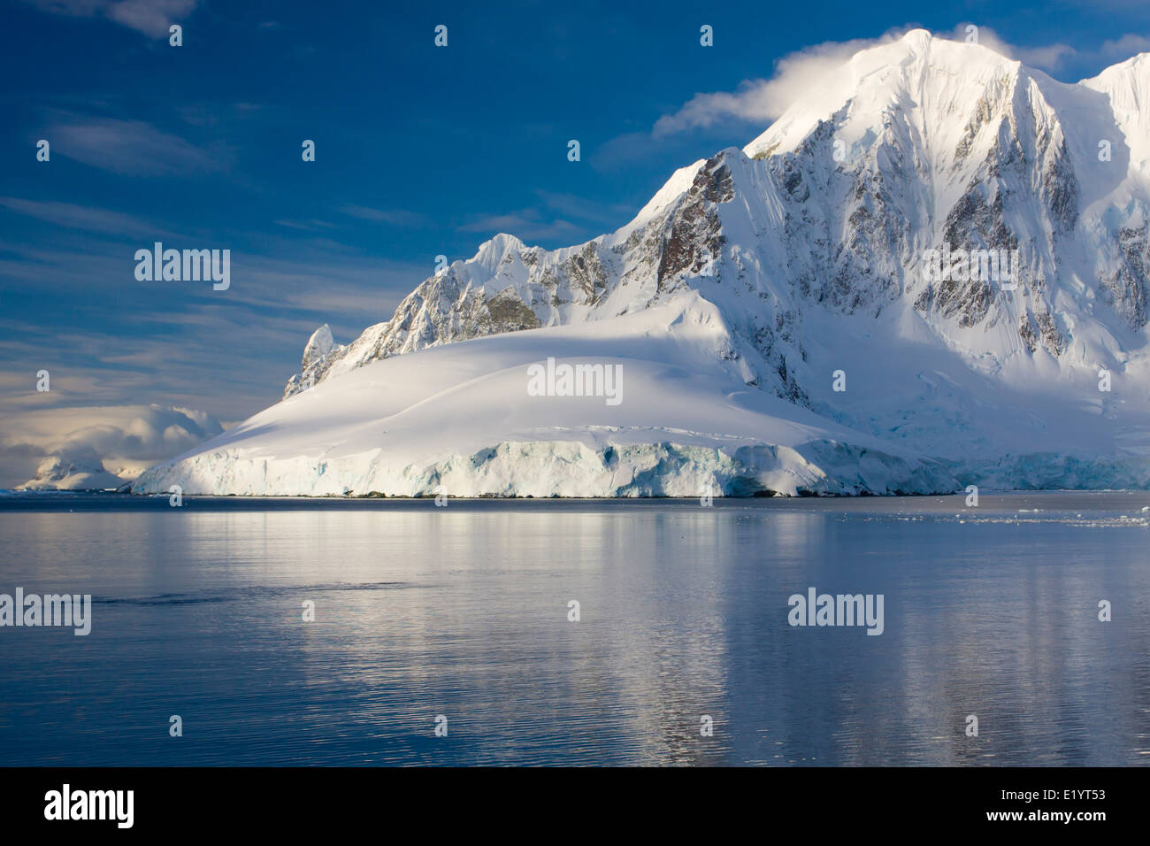 Beautiful snow-capped mountains against the blue sky Stock Photo - Alamy