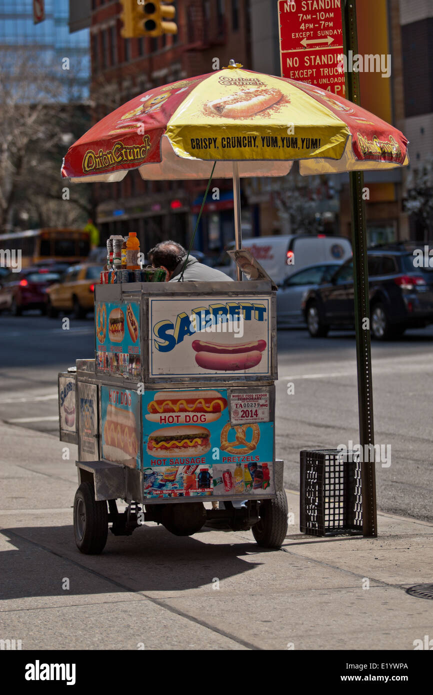 Street seller selling ice cream on the streets of Manhatten NY US Stock