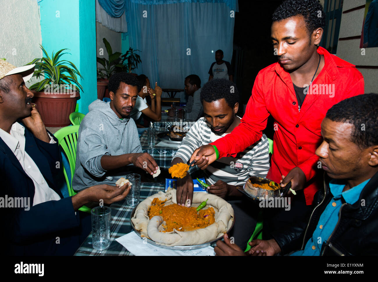 Ethiopians eating hi-res stock photography and images - Alamy