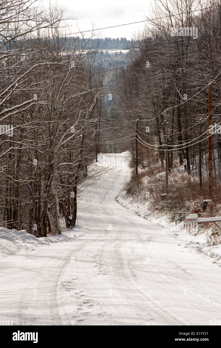 A winter scene of a snow covered country road in Stowe, Vermont Stock Photo Alamy