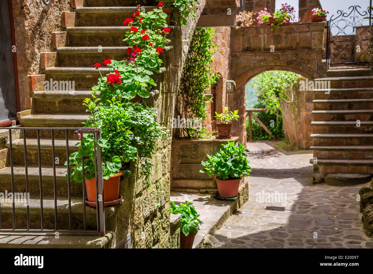 Old town full of flowery porches in Tuscany Stock Photo - Alamy