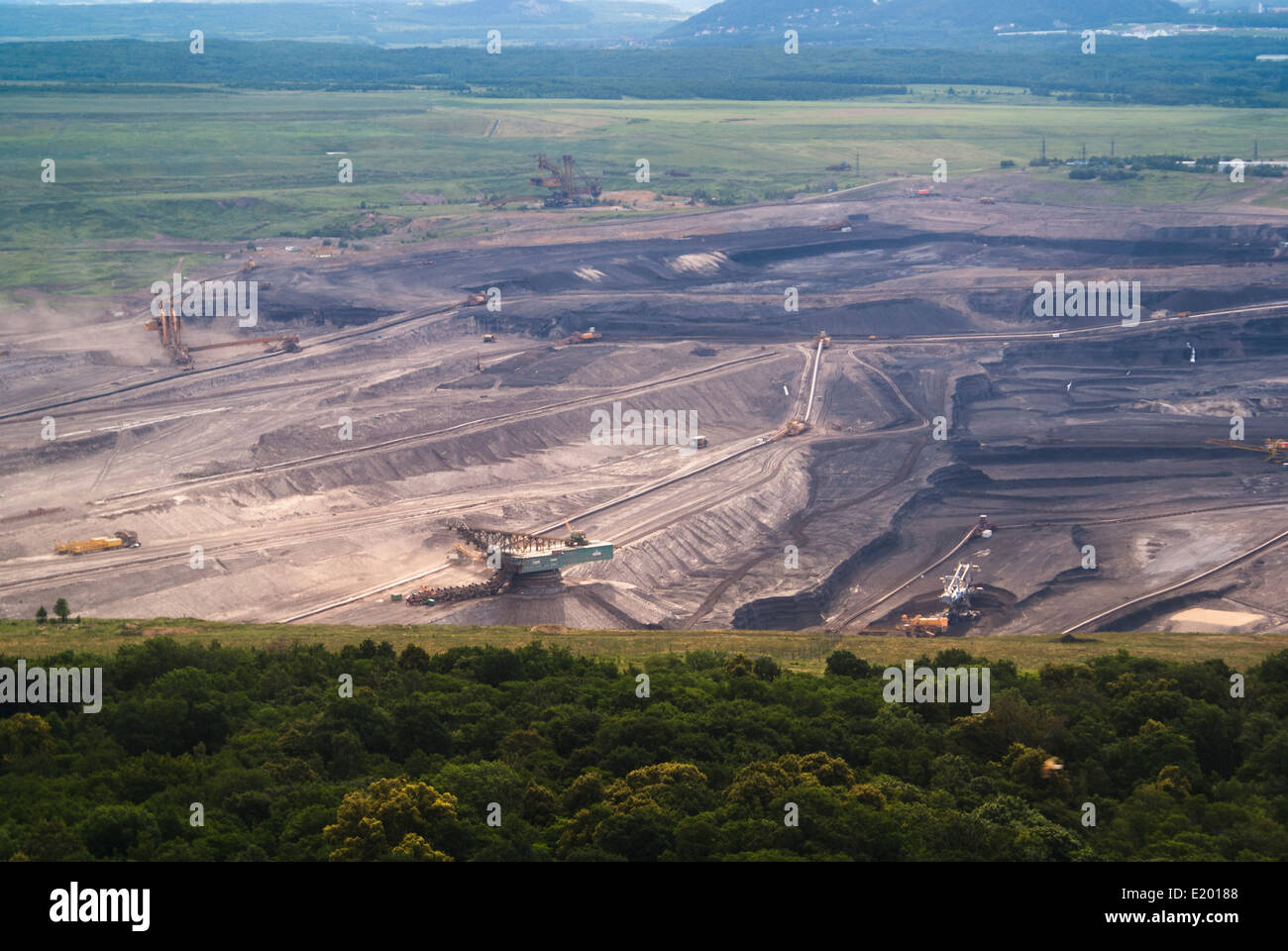 Ecological heavy land coal mining destroying earth Stock Photo - Alamy