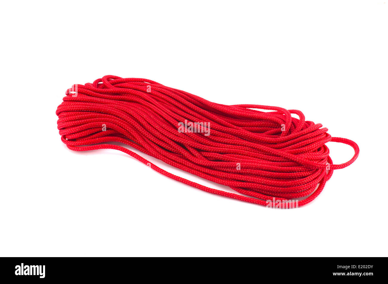 red string yarn thread  isolated on white Stock Photo