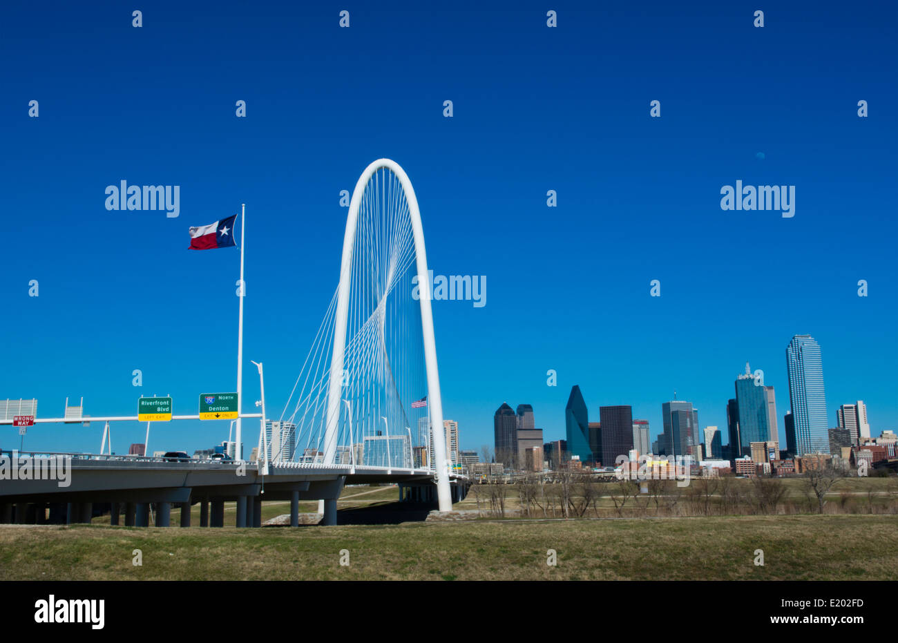 Dallas Texas new Margaret Hunt Hill Bridge white modern art structure in  downtown Dallas city with skyline in background Stock Photo - Alamy