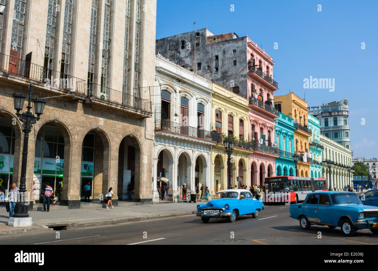 Havana Cuba old classic cars and taxis on street at Capital in downtown city of Habana with traffic and 1950s autos Stock Photo