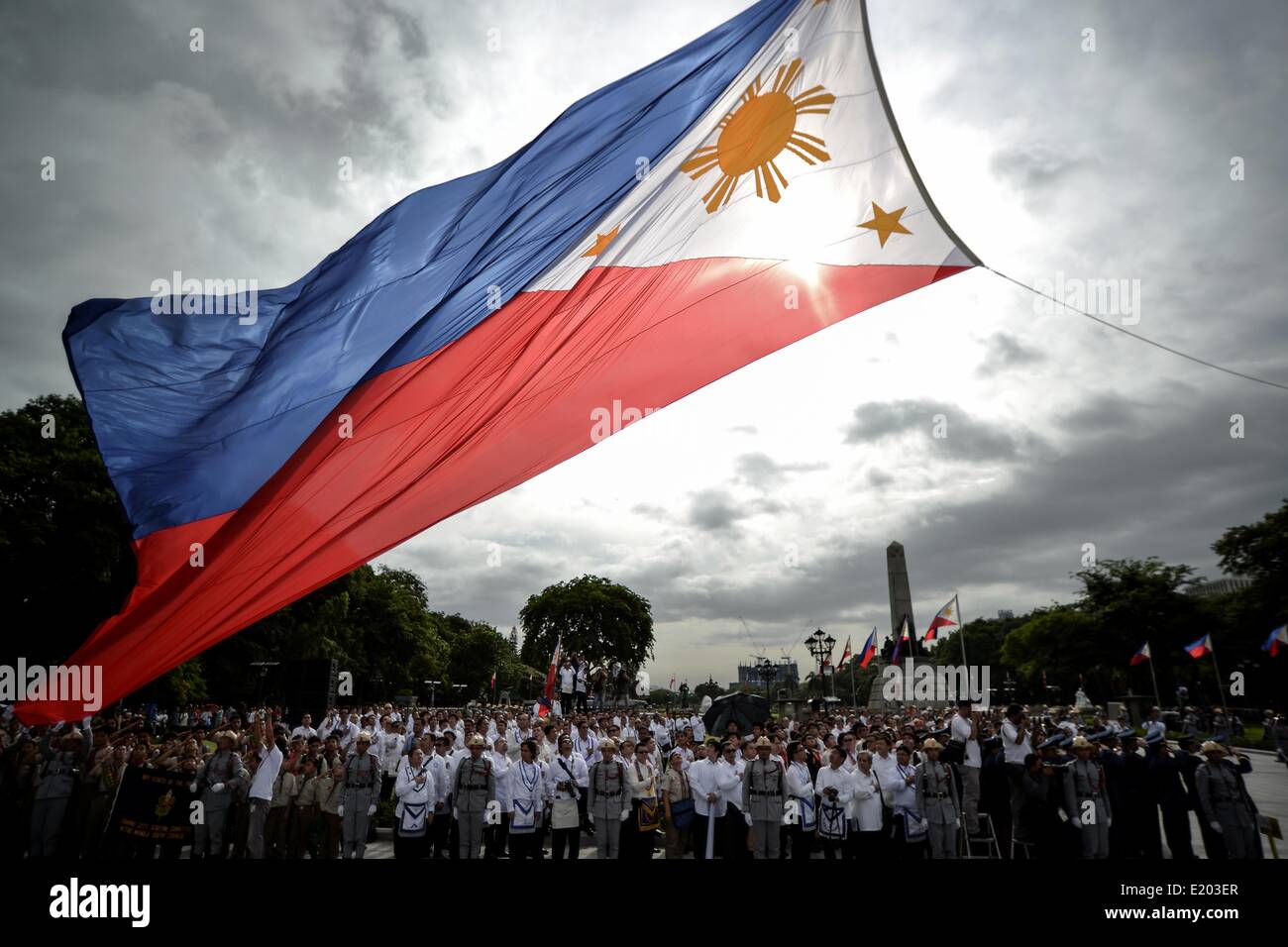 Philippine national flag raised during hires stock photography and