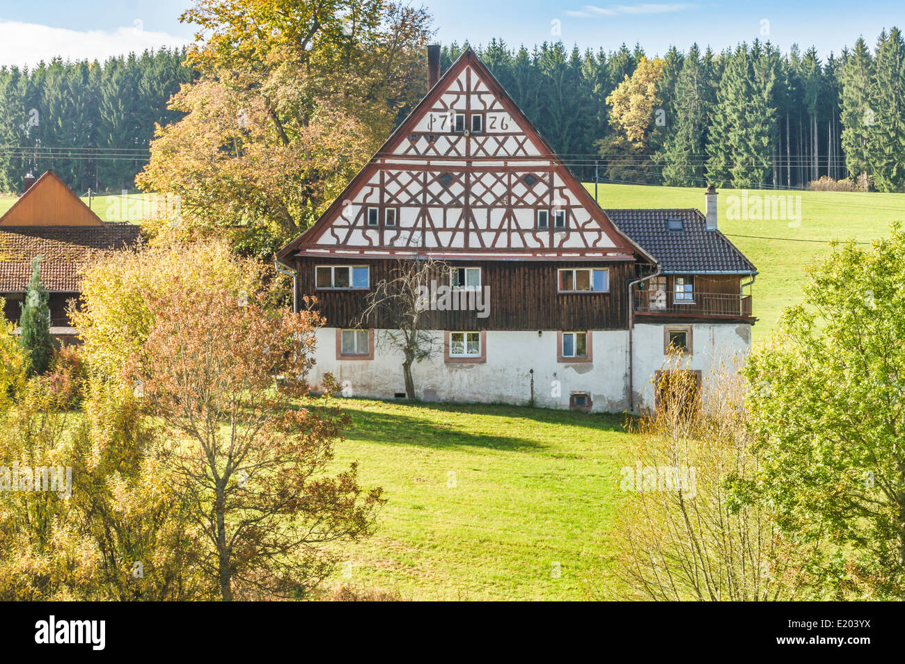 traditional half timbered black forest farm architecture, date on the gable reads 1726, middle
