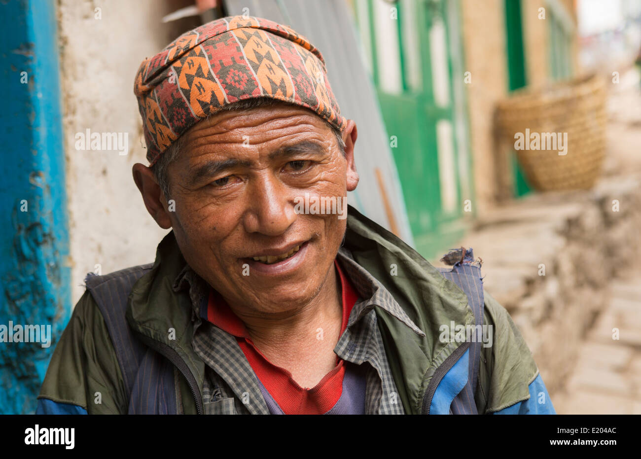 Nepal Porter poses for camera in Namche Bazarre remote, Mt Everest 78 Stock Photo