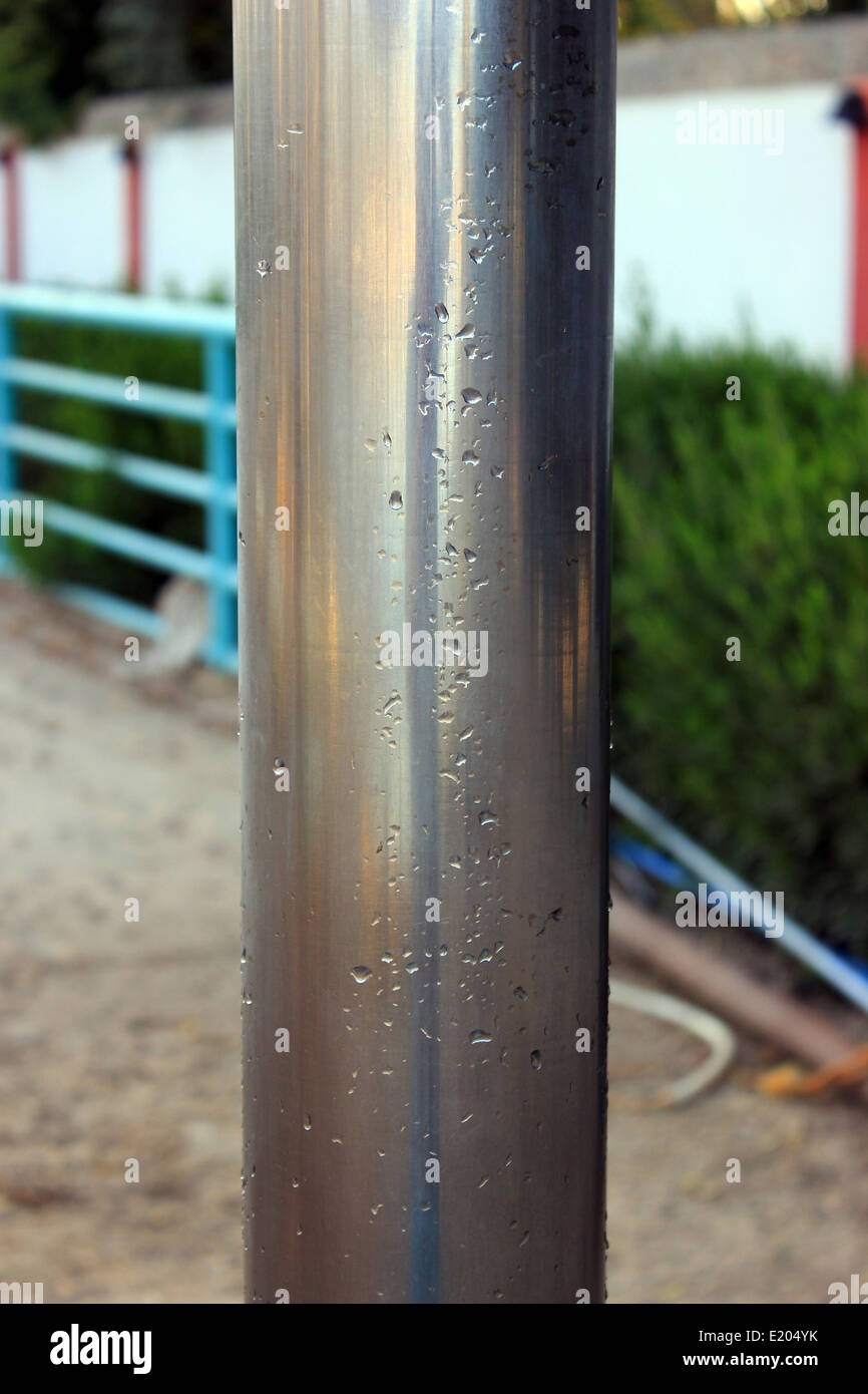 Close up of shiny metal pipe Stock Photo