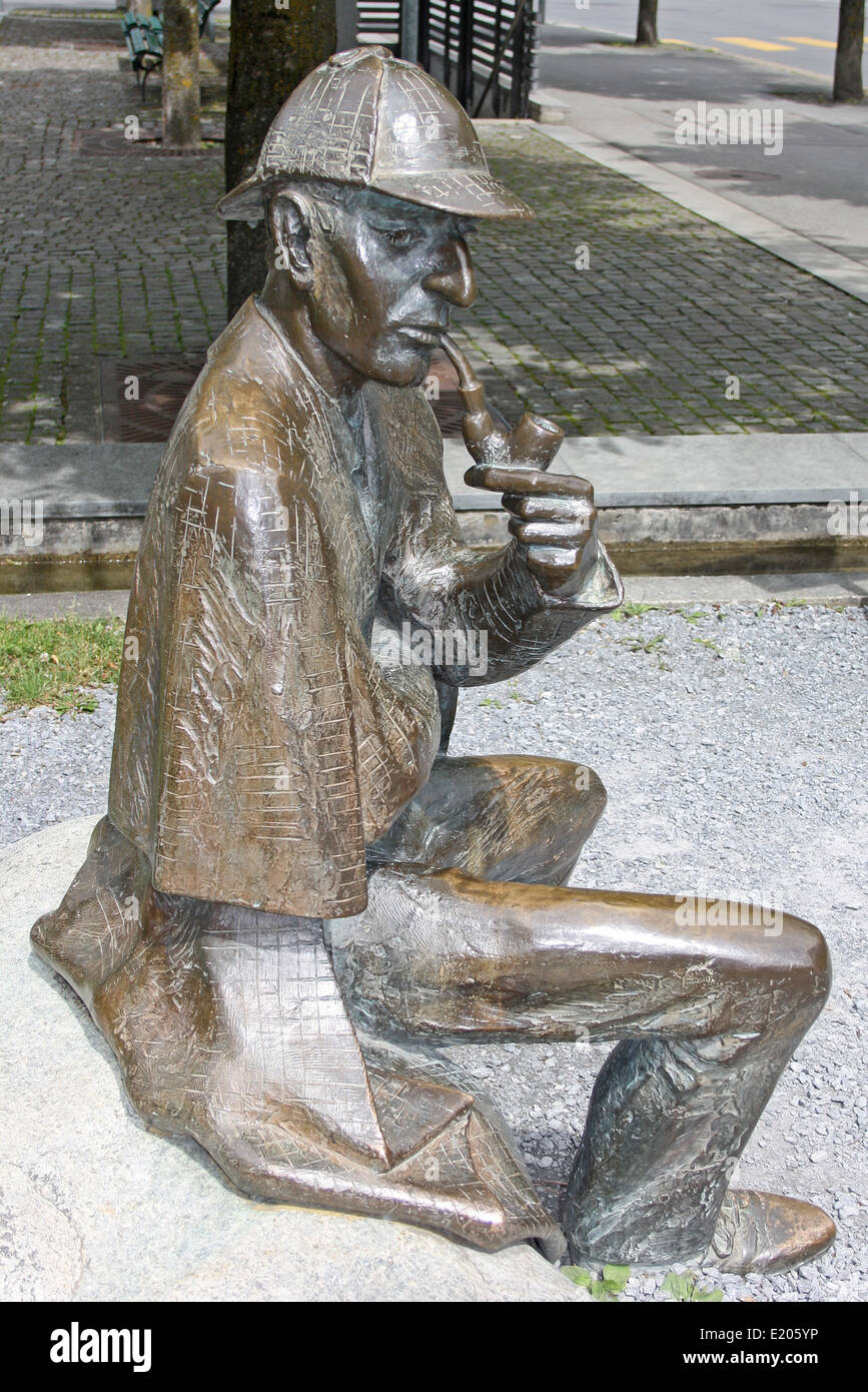 Statue of Sherlock Holmes at Meiringen, Switzerland, near the Reichenau Falls. Stock Photo