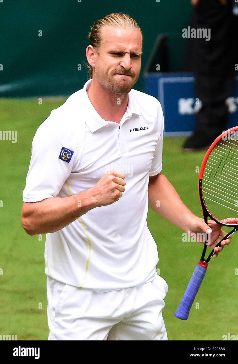 German tennis player Peter Gojowczyk reacts during the match against  Canadian tennis player Milos Raonic at