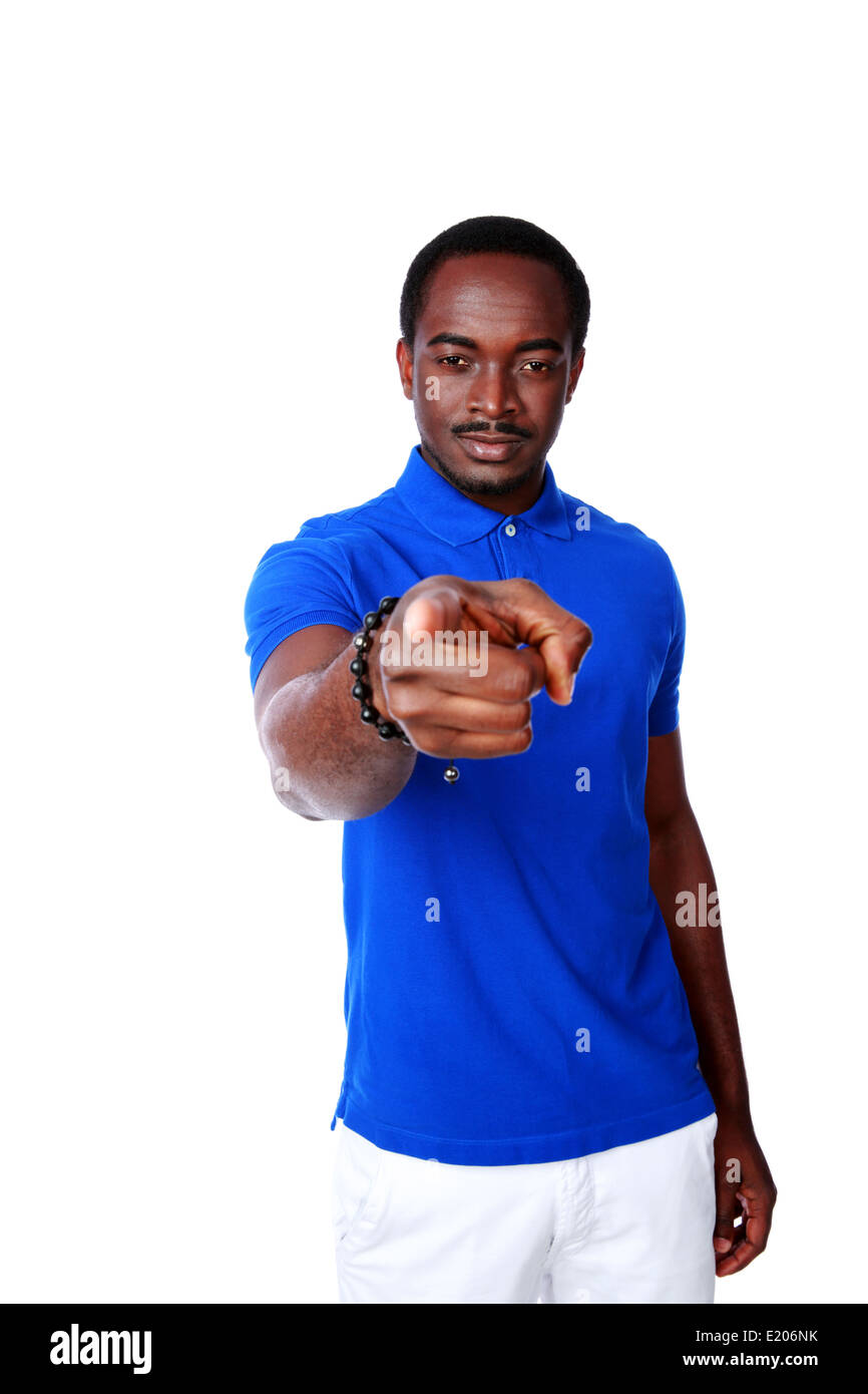 African man pointing at you over white background Stock Photo