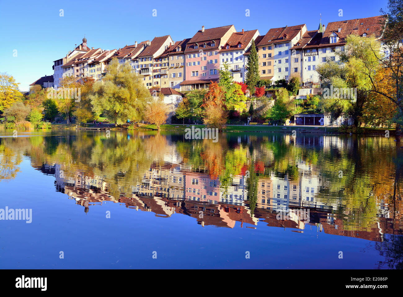 Historic centre of Wil with reflection in pond of municipal park, Canton of St. Gallen, Switzerland Stock Photo