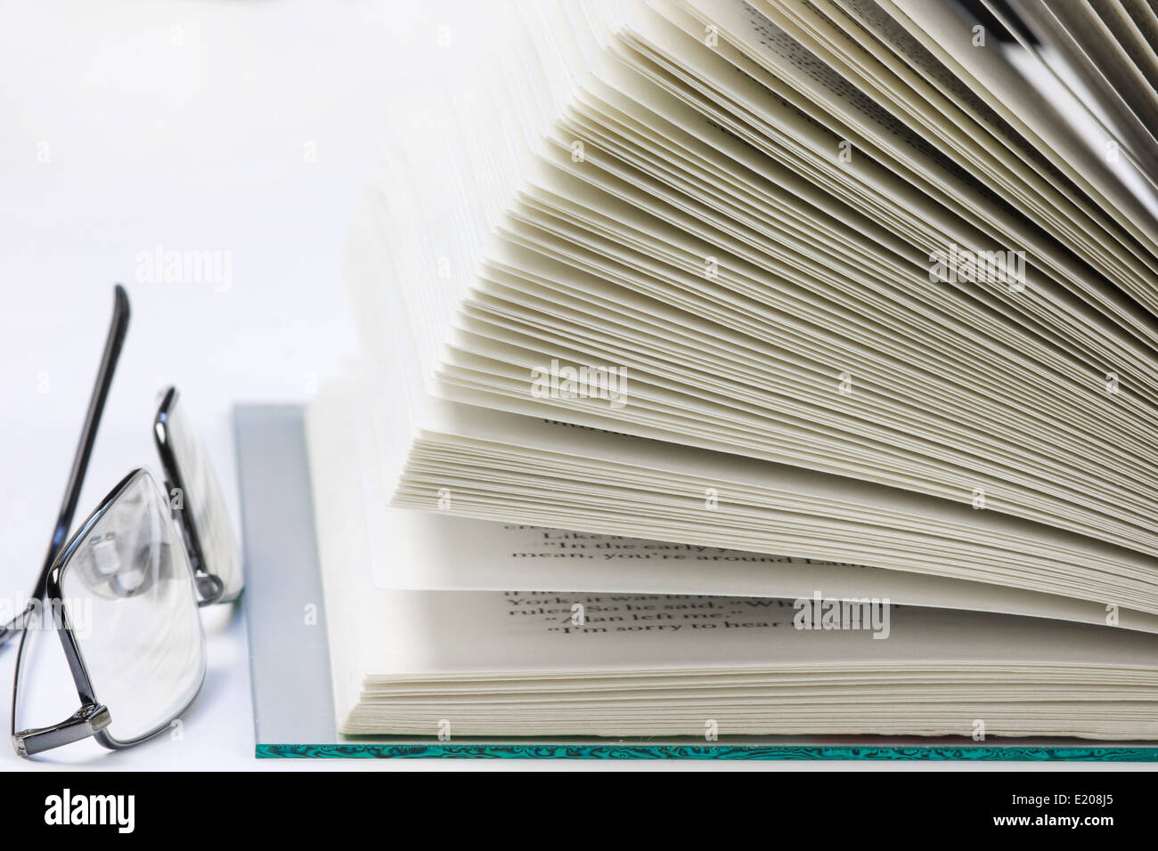 Open book isolated on a white background Stock Photo - Alamy