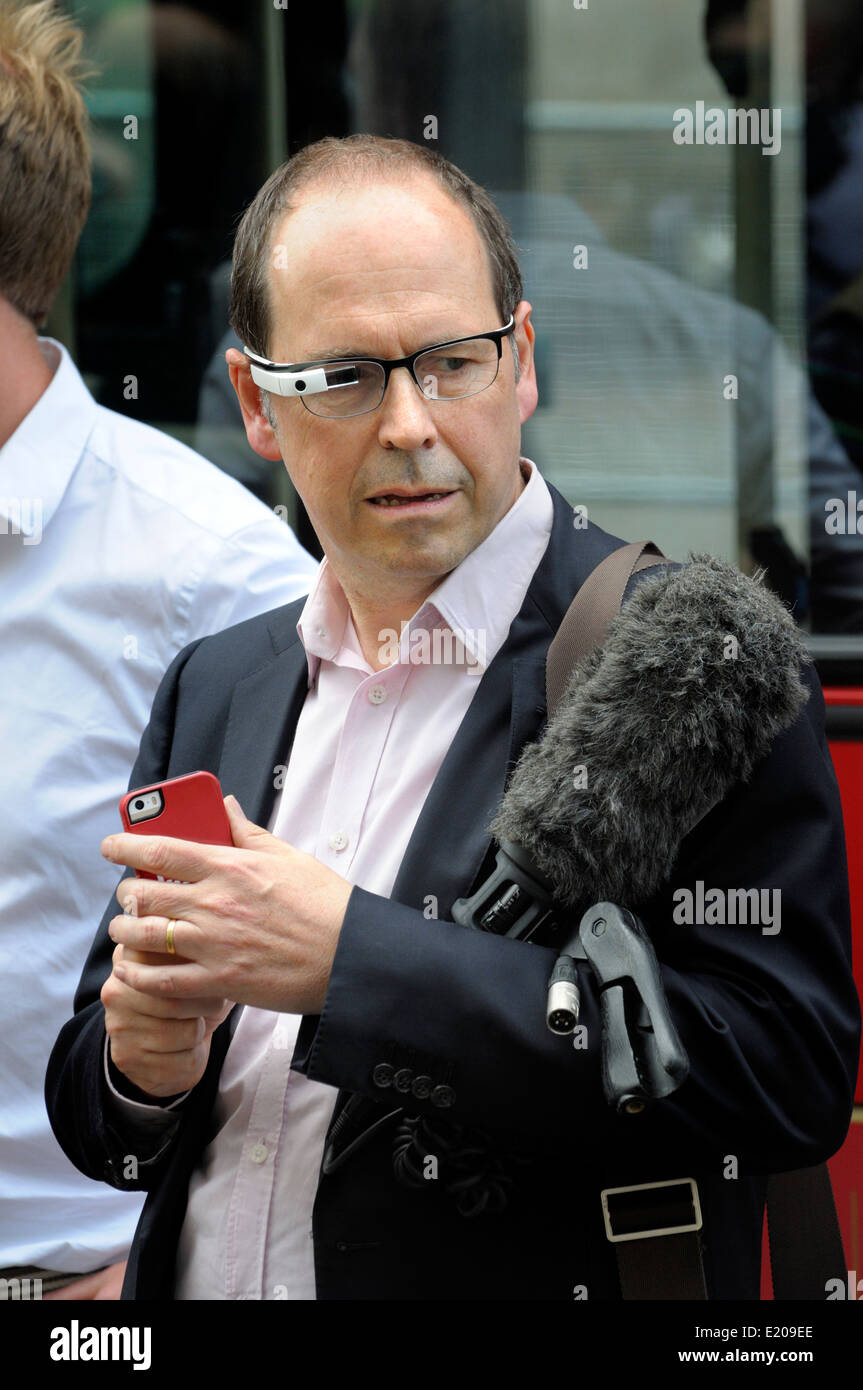 Rory Cellan-Jones, BBC's Technology Correspondent, reporting in central London,wearing Google Glass Stock Photo