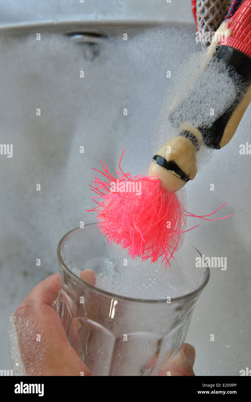 Novelty punk rocker washing up sponge dish plate glass cloth cleaner. Stock Photo