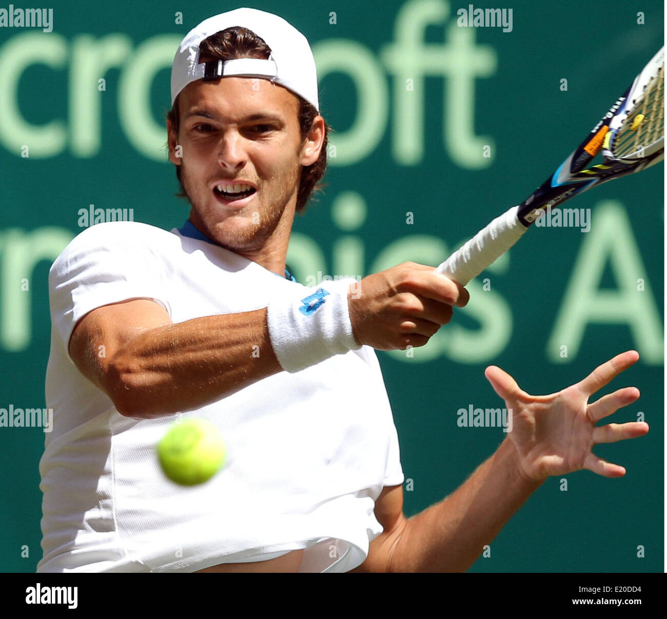 Halle (Westphalia), Germany, 12 June 2014. Portugal's Joao Sousa in action  against Switzerland's Roger Federer during the ATP tournament in Photo:  OLIVER KRATO/dpa/Alamy Live News Stock Photo - Alamy