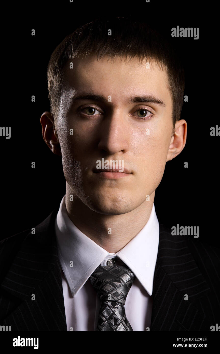 man in suit on black Stock Photo - Alamy