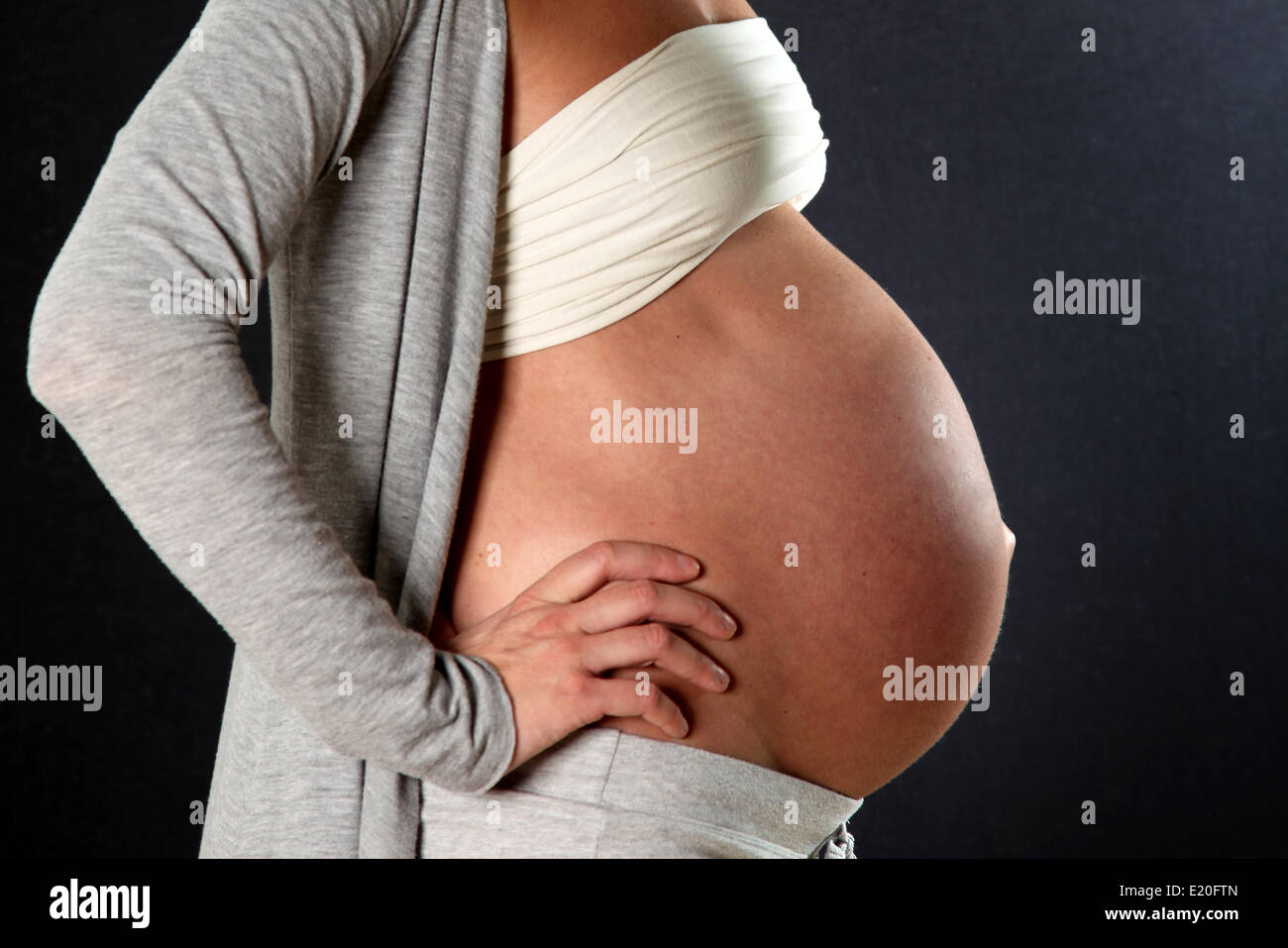 Belly of a pregnant woman Stock Photo