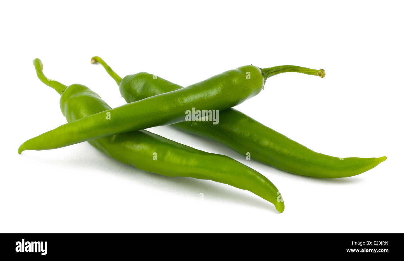 Three green chili peppers on white Stock Photo Alamy