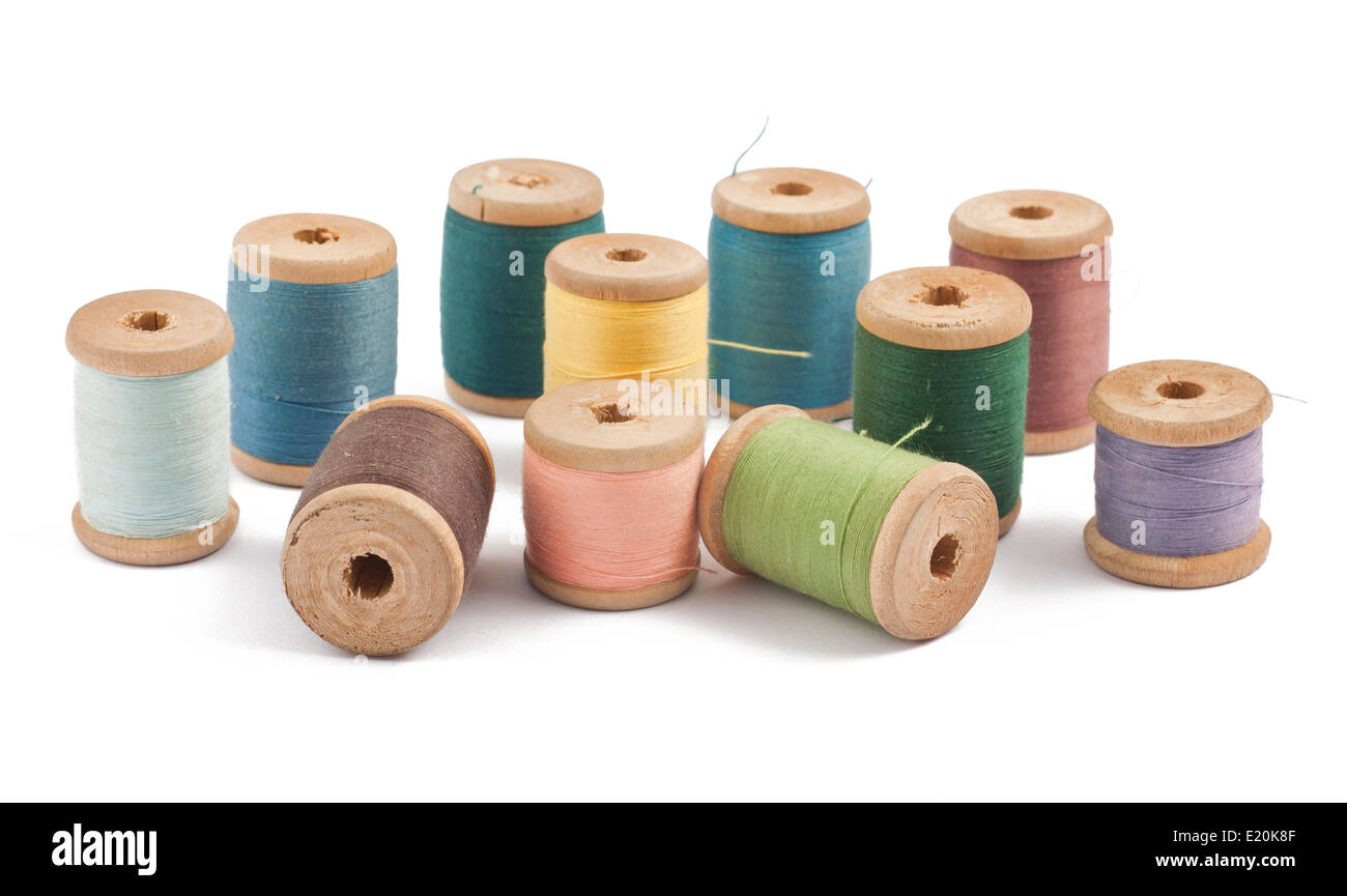 Wooden multicolored thread coils Stock Photo