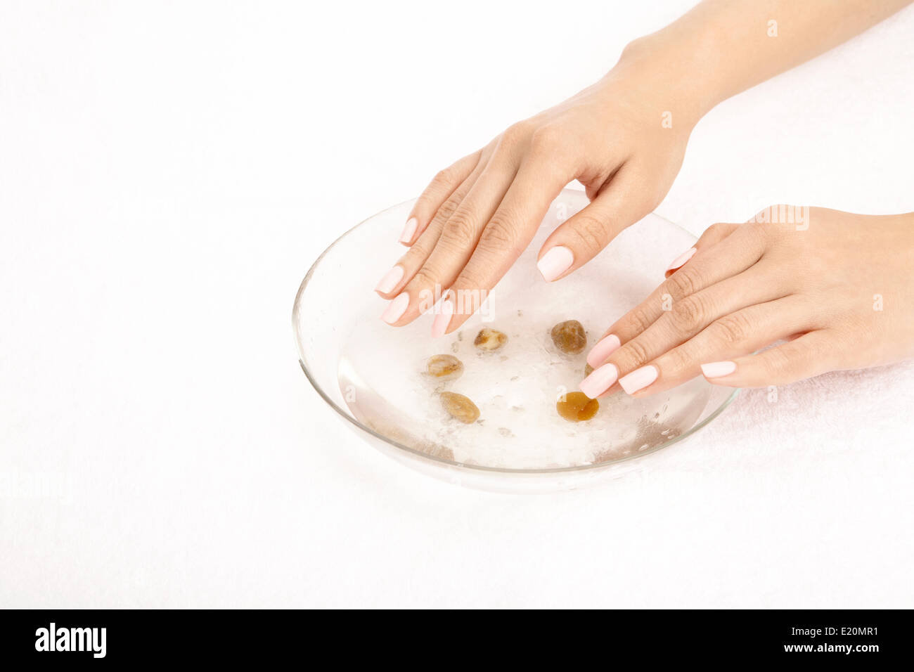 Hands take the salt bath Stock Photo