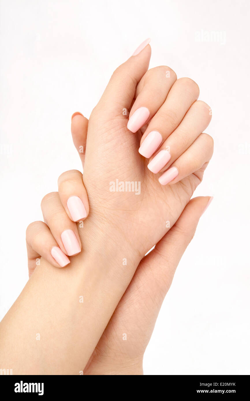 Two beautiful female hands with manicure Stock Photo - Alamy