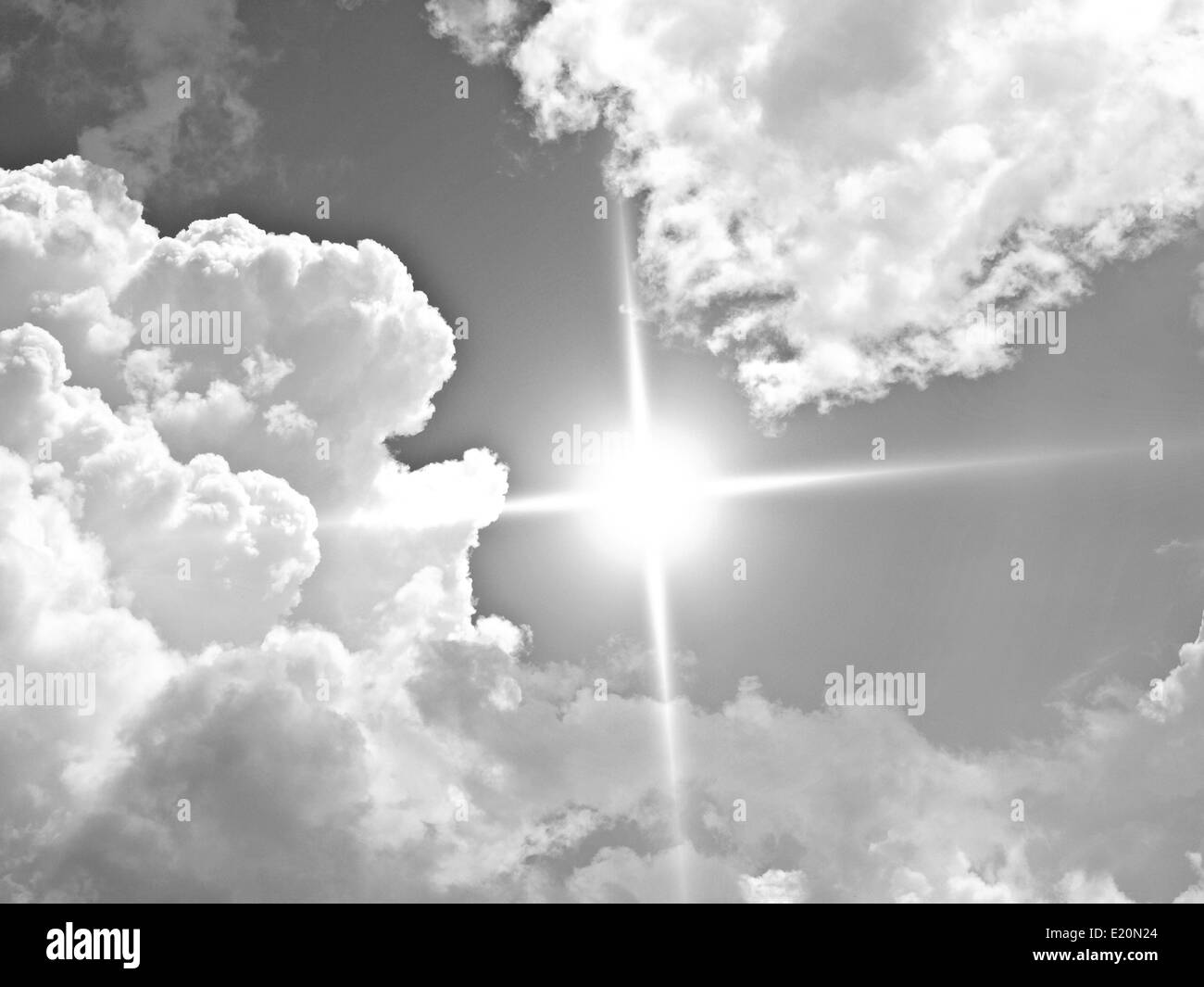 Sun rays clouds blue sky Black and White Stock Photos & Images - Alamy