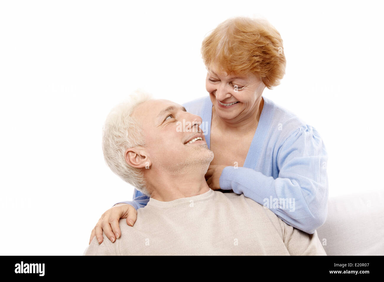 Smiling elderly couple on a white background Stock Photo