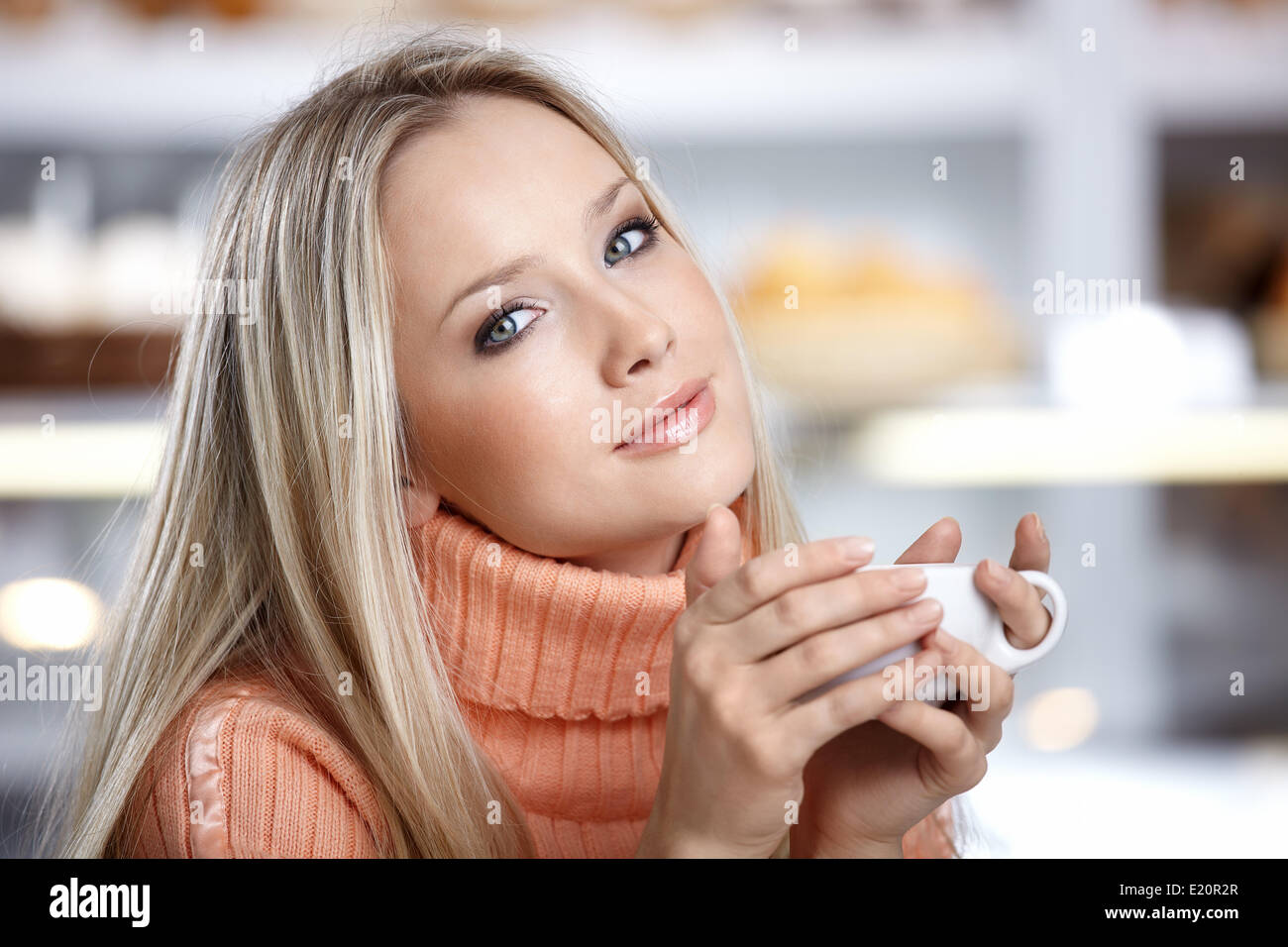The young beautiful girl with a cup Stock Photo