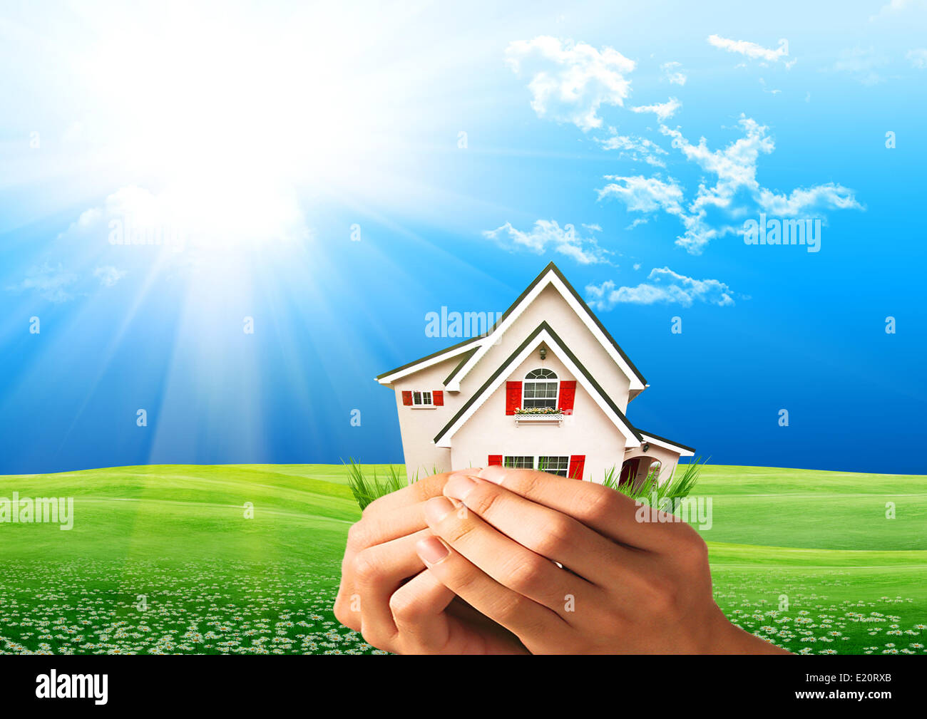 human hands holding model of a house Stock Photo - Alamy