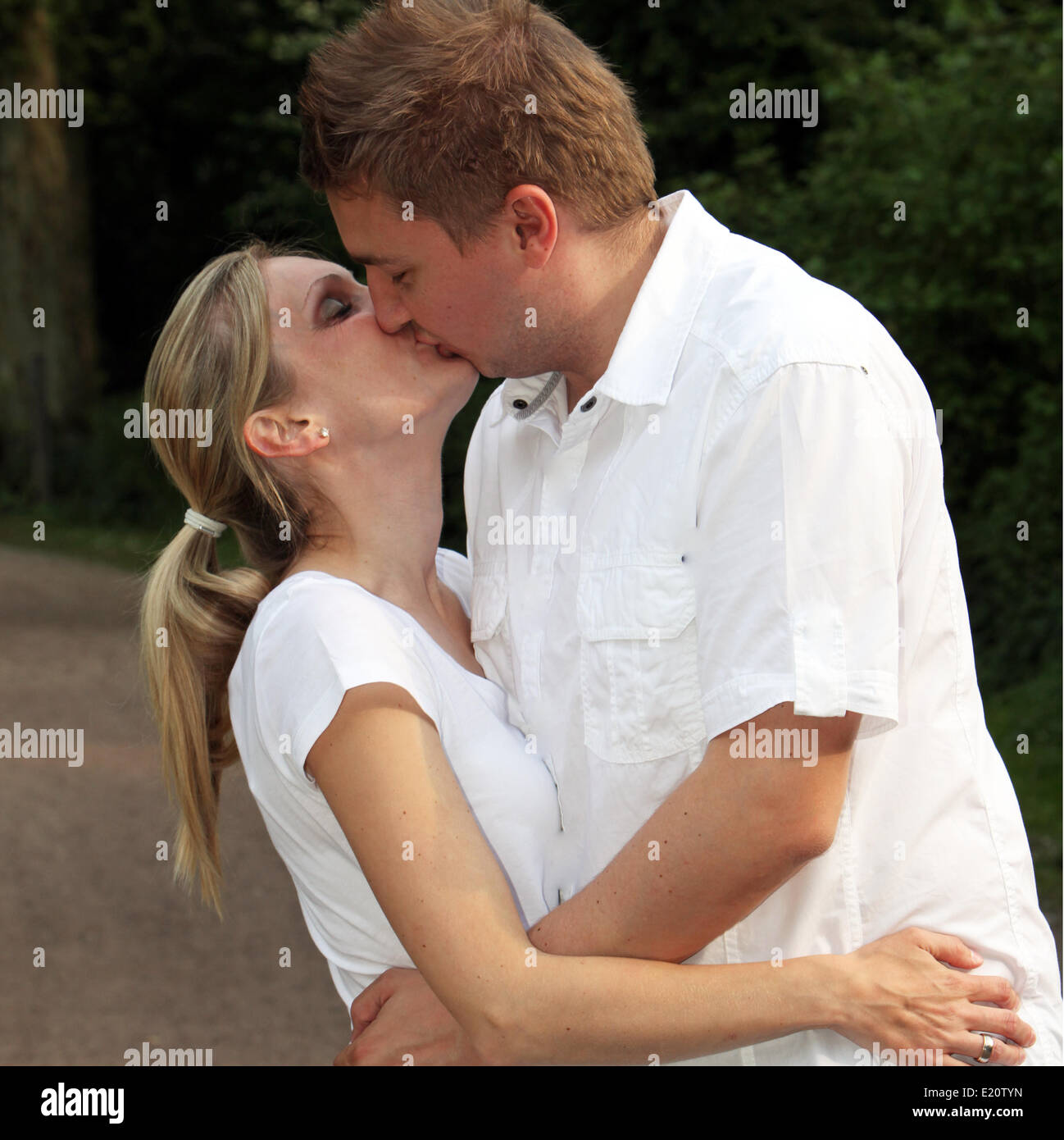 - Young couple kissing - square Stock Photo