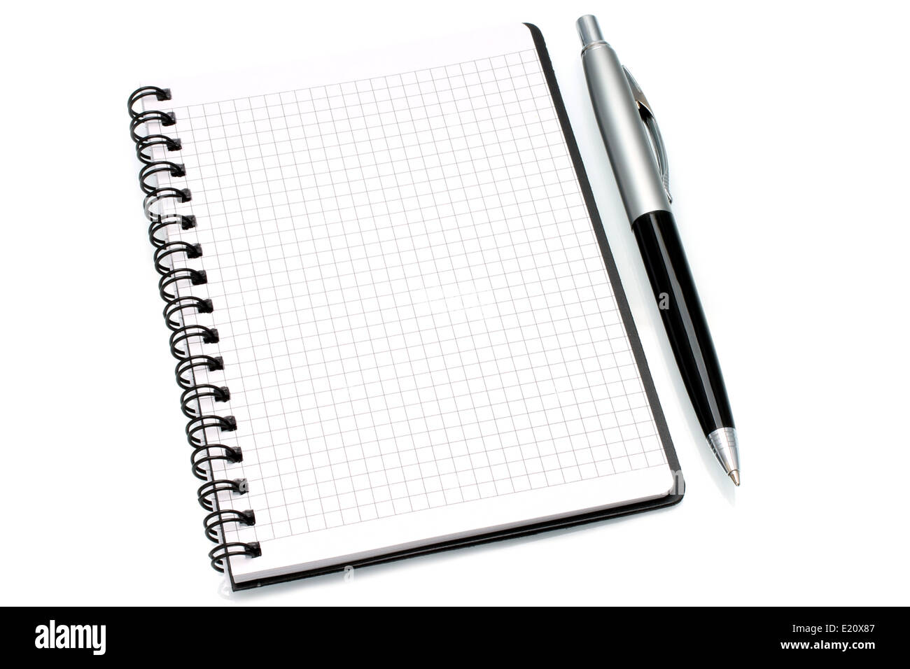 Notepad with ball pen on a white background Stock Photo - Alamy