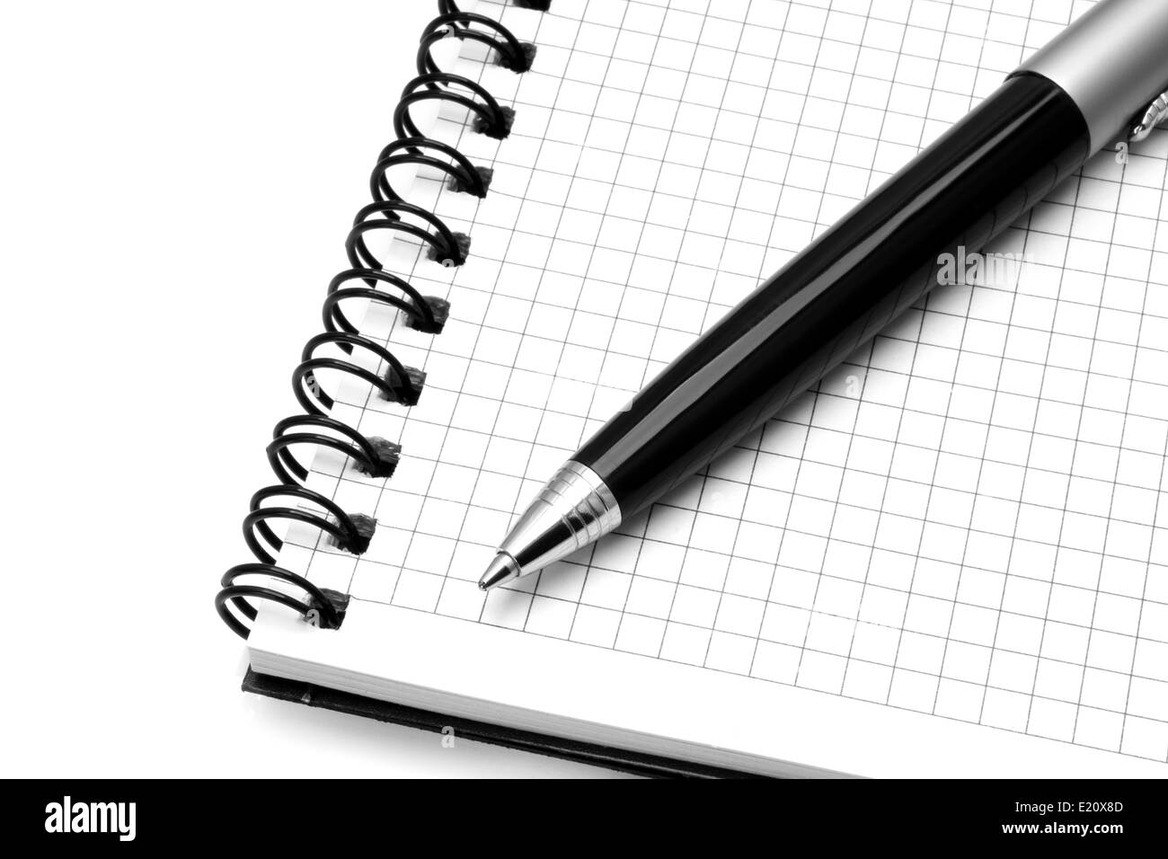 Notepad with ball pen on a white background Stock Photo - Alamy