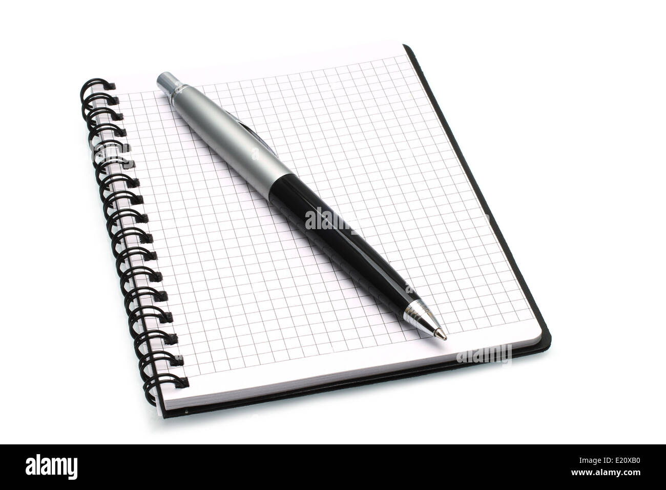 Notepad with ball pen on a white background Stock Photo - Alamy