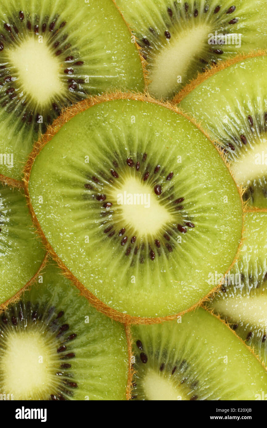 Background of cut kiwi fruit close-up Stock Photo - Alamy