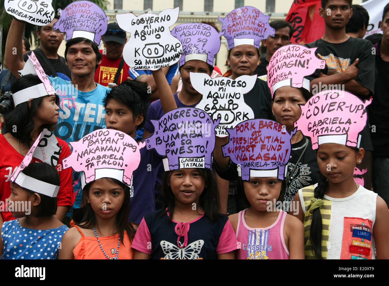 Manila, Philippines. 12th June, 2014. Young kids wearing slogans