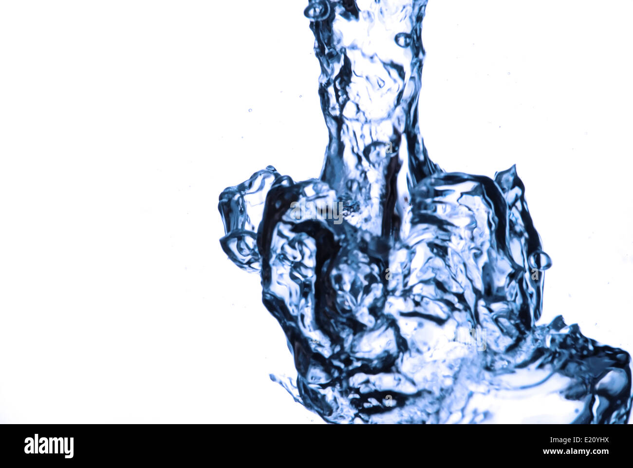 Pouring blue water is frozen on white background Stock Photo Alamy