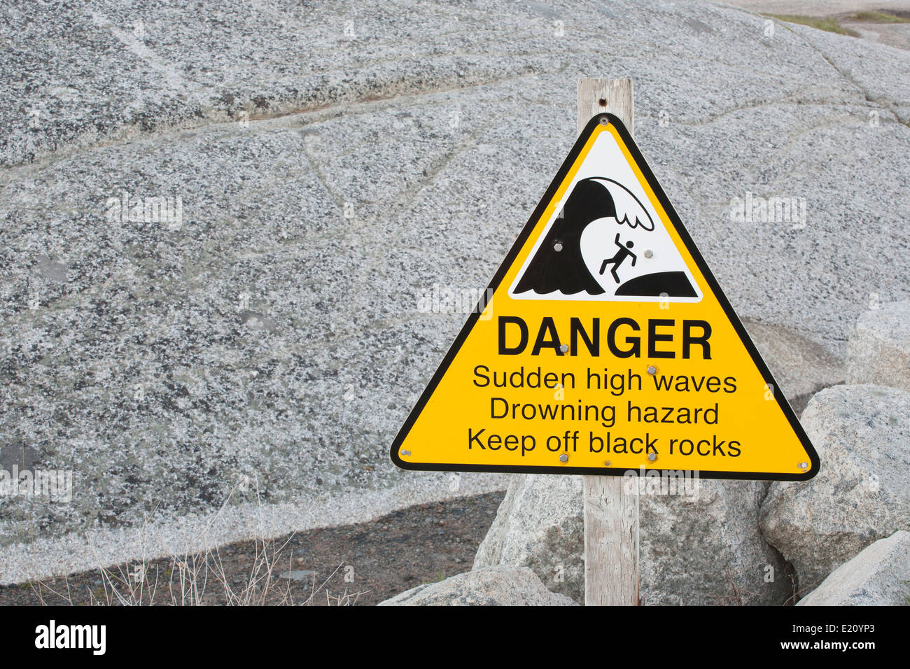 Danger - high waves hazard sign. Stock Photo
