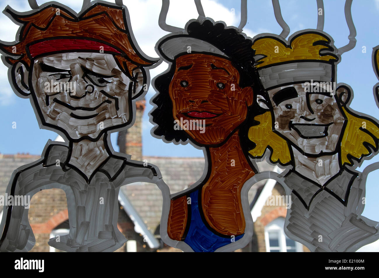 Wimbledon London, 12th June 2014. A restaurant in Wimbledon displays caricatures of tennis players  Roger Federer (R) Venus Williams ( C)  and Andre Agassi (R)  on the windows in  the run to the 2014 lawn tennis championships in Wimbledon Credit:  amer ghazzal/Alamy Live News Stock Photo