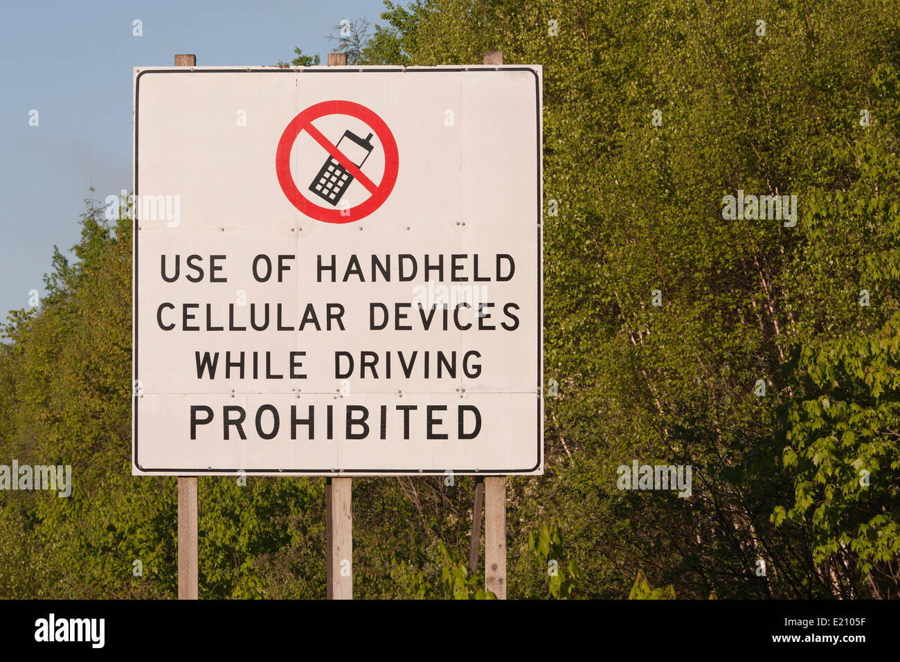 Sign Use of handheld cellular devices while driving prohibited Stock Photo Alamy