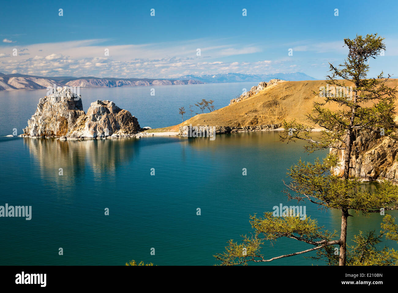 View of coast of Baikal lake, Shaman rock and cape Burhan on Olkhon Island, Russia Stock Photo