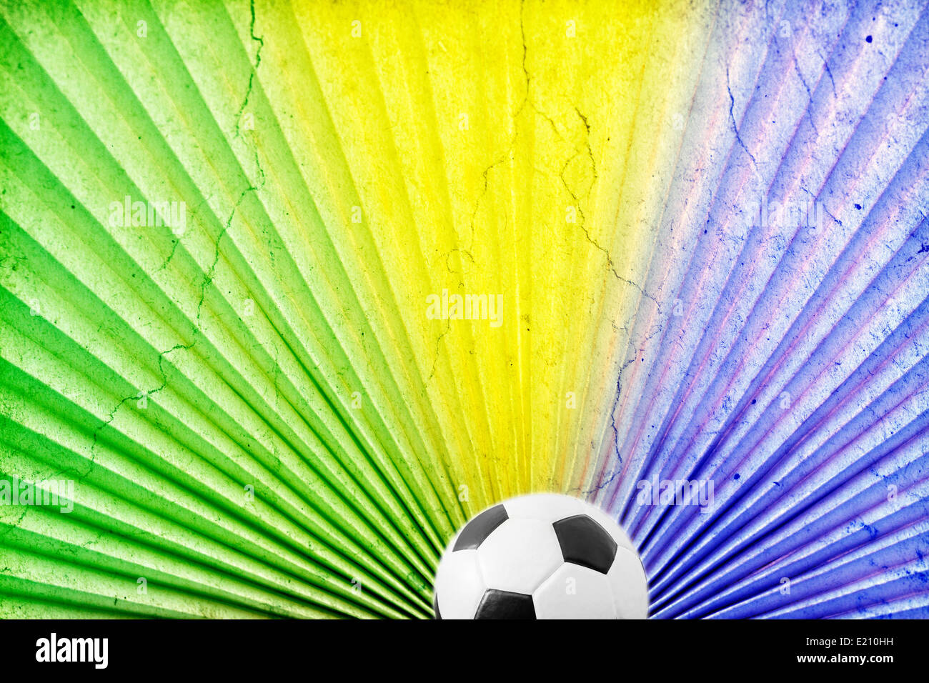 Vintage photo of soccer ball and the colors of the Brazil flag Stock Photo