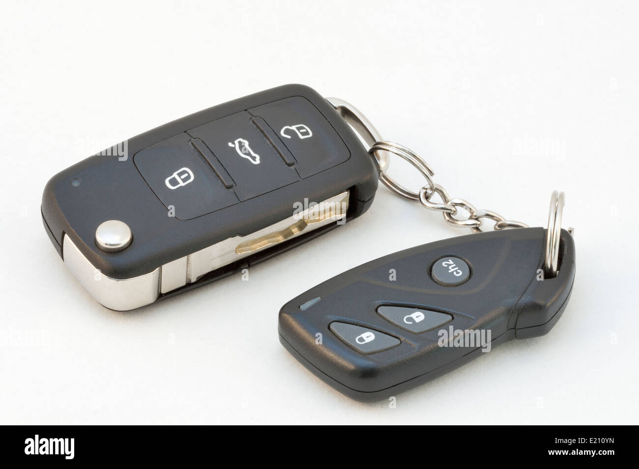 Modern Car Key and Remote against White Background Stock Photo