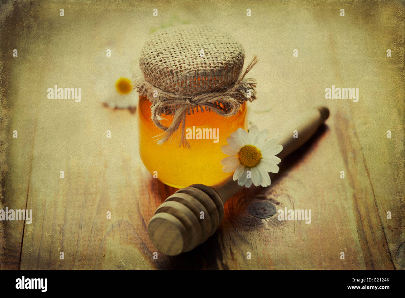 Full honey pot and honey stick Stock Photo Alamy